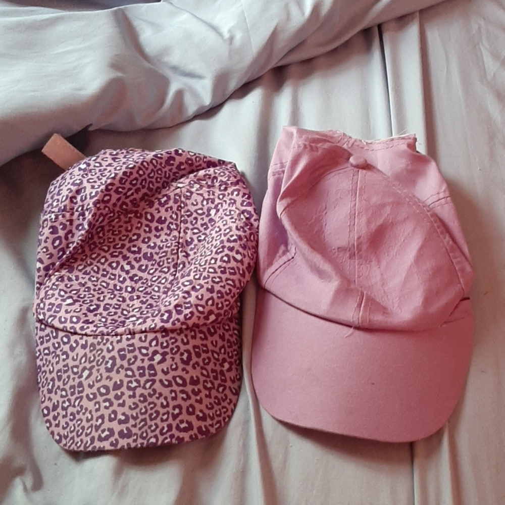 2 purple hats 1 leopard print